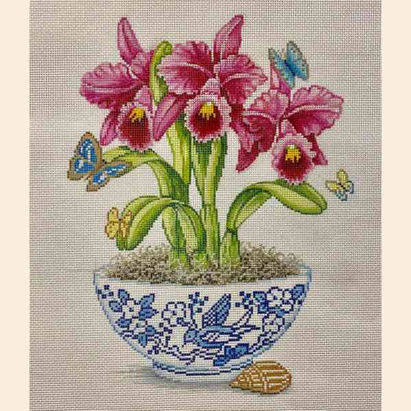 FUSCHIA ORCHIDS IN VASE