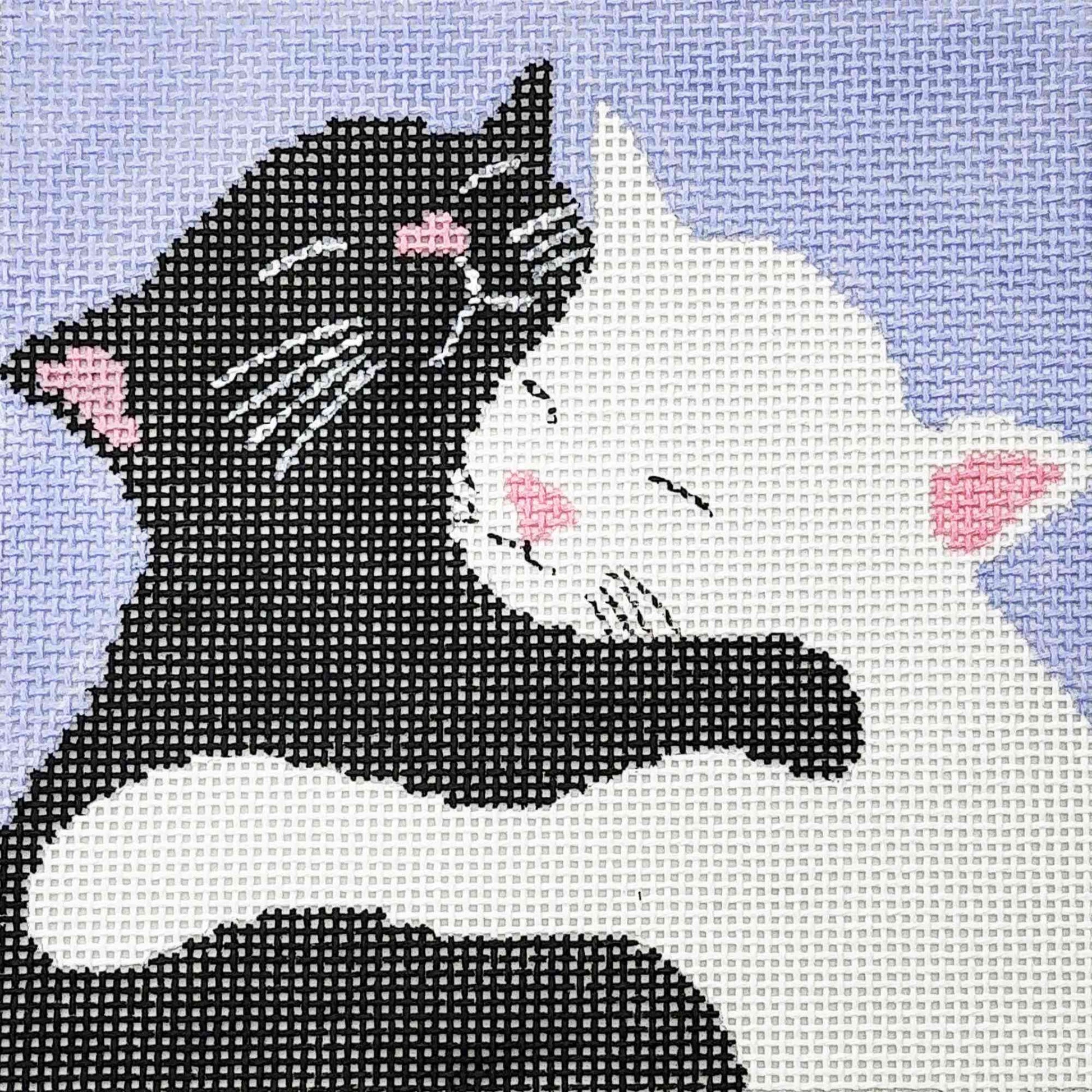 Cats hugging